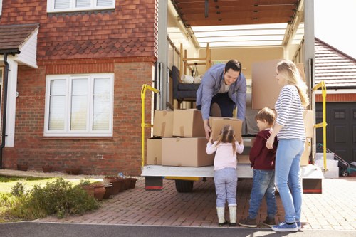 Workers reviewing ethical compliance documents for Holloway Removals