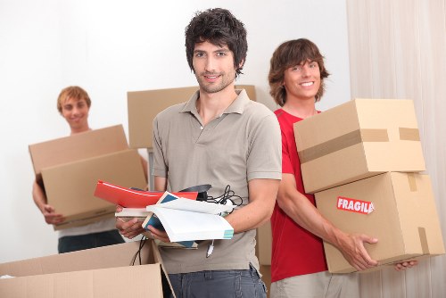 Careful packing and loading by house removal specialists in Holloway